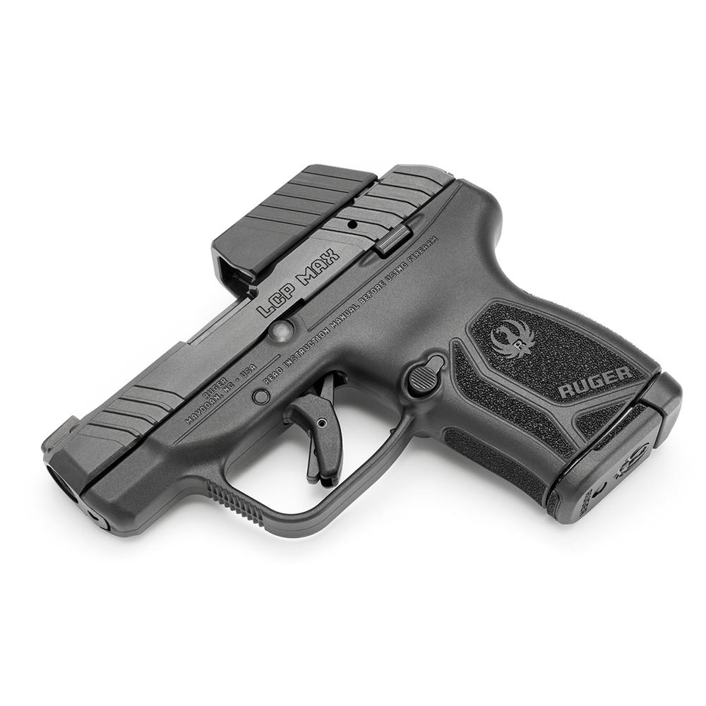 Photorealistic 8K alternative angle image of the Ruger LCP Max .380 Auto handgun from the top view, showing the 2.8-inch barrel, magazine well, and controls, on a neutral surface for scale