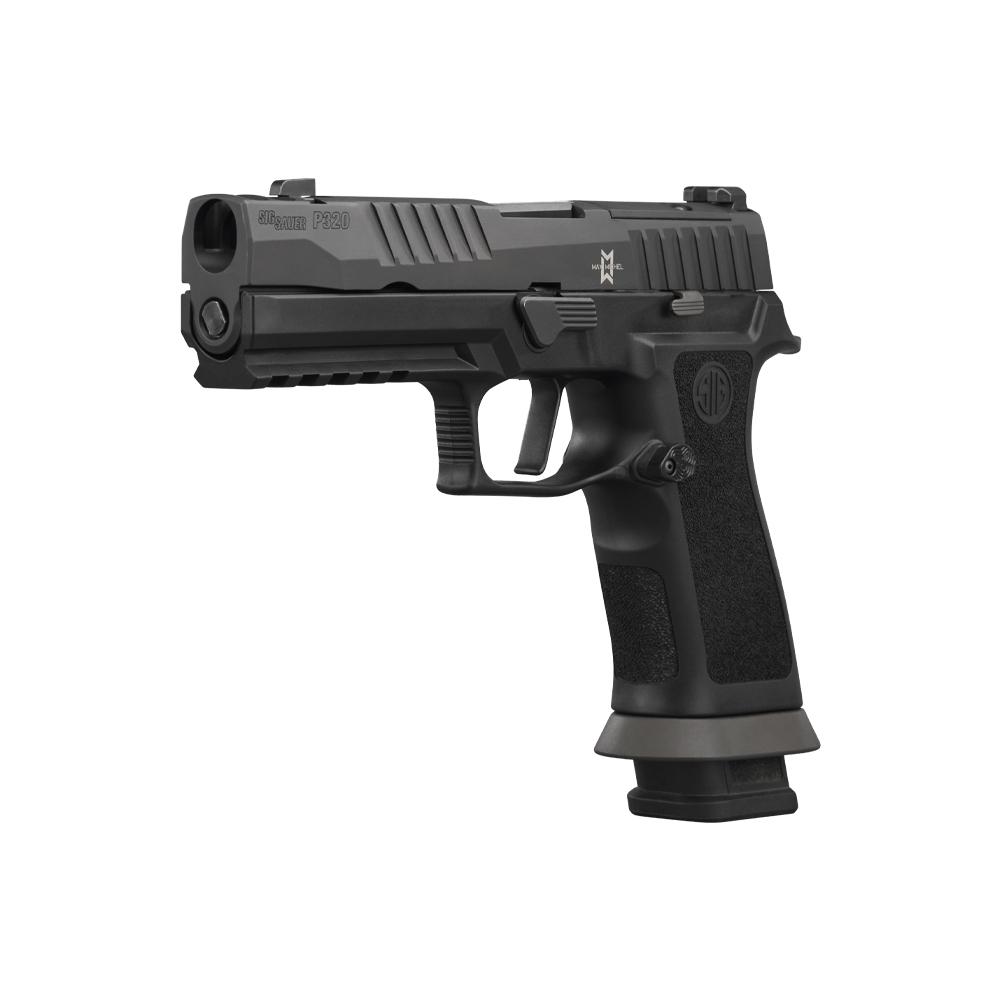 Three-quarter angle view of Sig Sauer P320 M.O.D. X resting on dark tactical surface with three 21-round magazines fanned out, clean composition, premium lighting, photoreal 8K