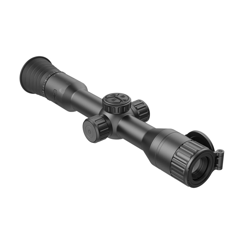 Lifestyle in-use image of the black AGM Spectrum 4K Mini Night Vision Scope mounted on a modern rifle, low-light outdoor setting at dusk, photoreal 8K, natural environment