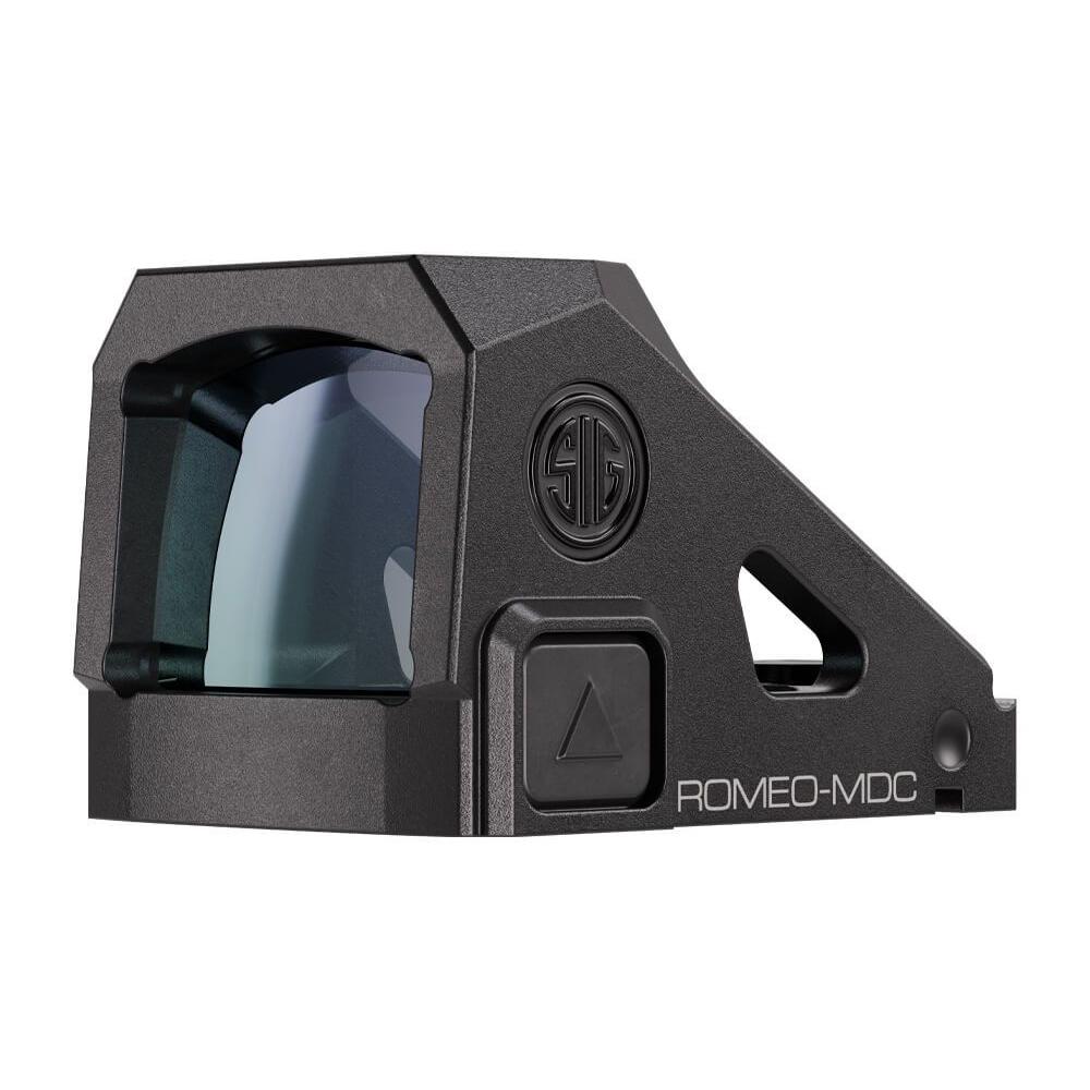 Scale reference image with the Romeo-MDC placed beside a standard pistol slide and coin, clean white background, soft shadows, precise product dimensions visible, 8K commercial photography
