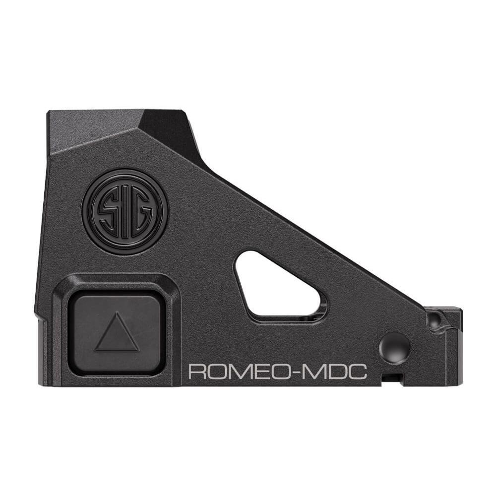 Alternative three-quarter angle view of the Romeo-MDC red dot sight on a dark carbon-fiber surface, highlighting compact profile and black anodized aluminum, premium studio lighting, 8K photoreal