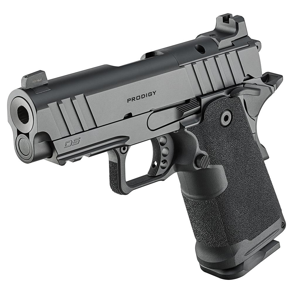 Side profile view of the Springfield Armory 1911 DS Prodigy Compact with two 15-round magazines visible, placed on dark premium surface, dramatic studio lighting, photorealistic 8K